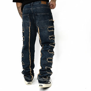 EDGE CUT DENIM JEANS