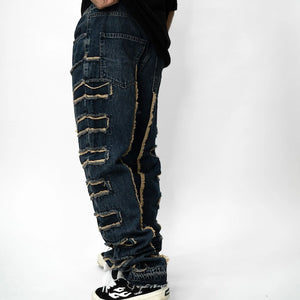 EDGE CUT DENIM JEANS