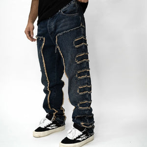 EDGE CUT DENIM JEANS